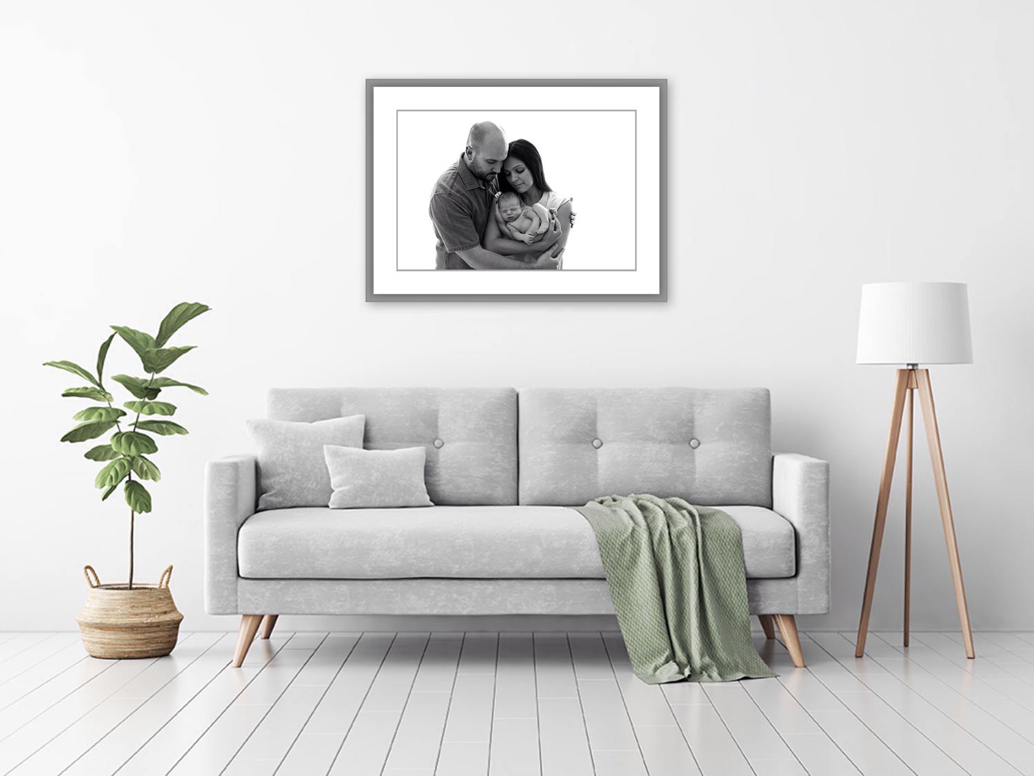 Covid-19 studio closed. Portrait of family hung on the wall over the sofa