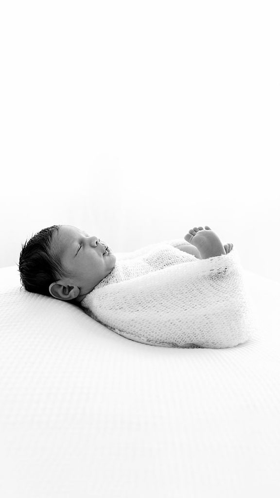 newborn boy swaddled South West London newborn photo session