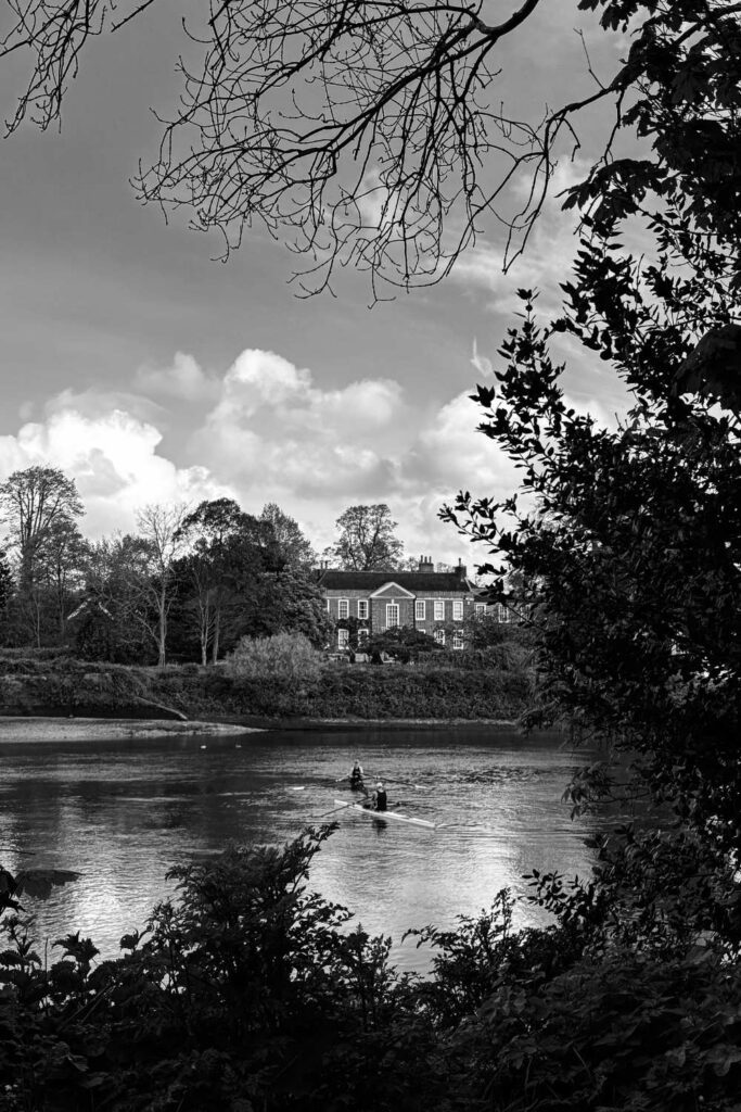 2 people canoeing in the river