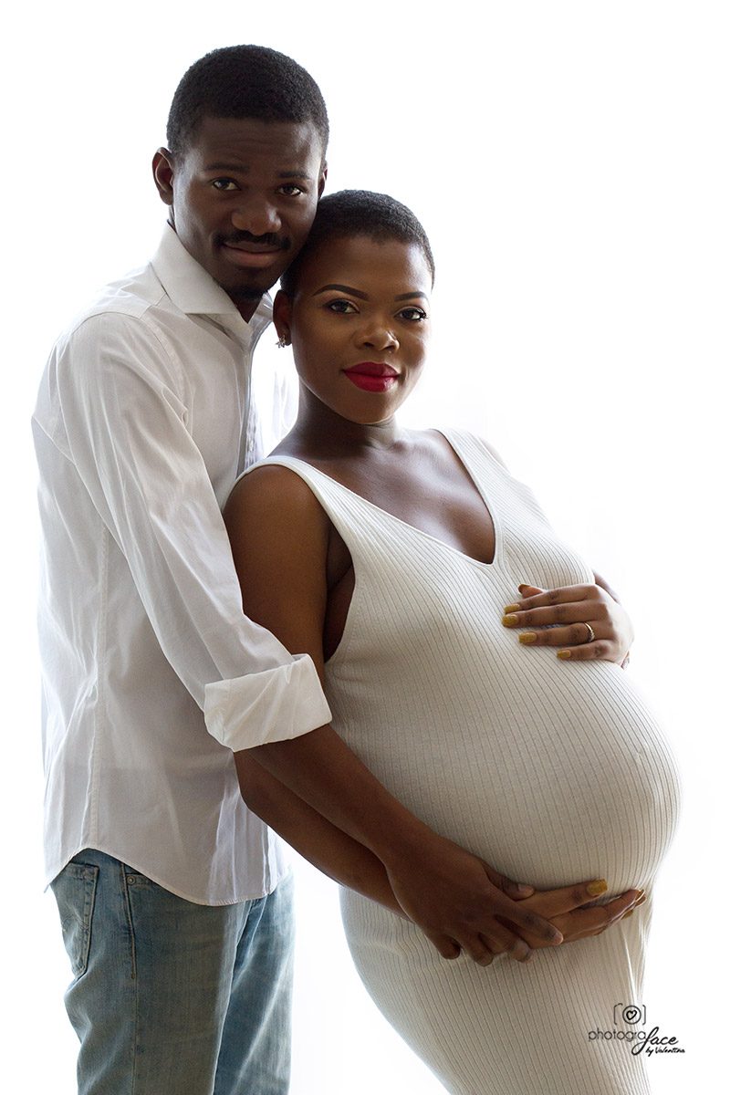 Expecting couple embracing during a minimalist maternity photoshoot – highlighting the emotional connection and beauty of pregnancy. Why-maternity-photography.