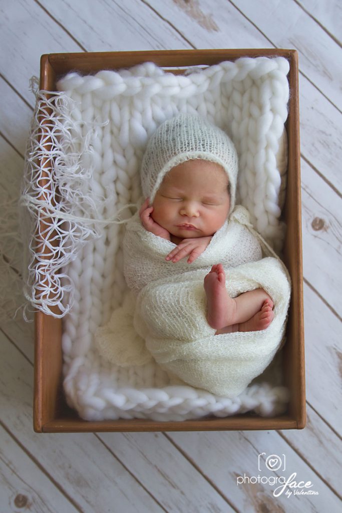 newborn photographer London - baby sleeping in basket