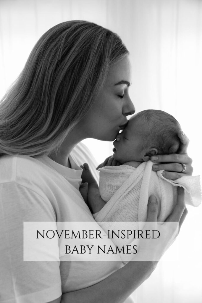 Mum kissing her newborn baby on the forehead during a baby photoshoot in London