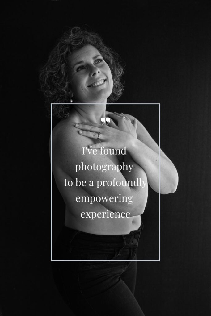 Woman holding hands on shoulder as a self-love act
