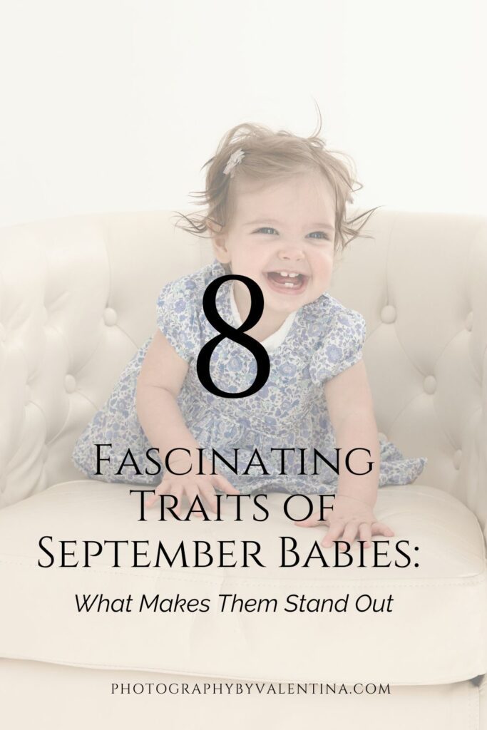 Baby girl smiling on the cover for September Babies facts